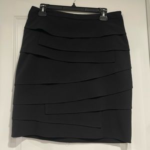 Ruffled black mini skirt